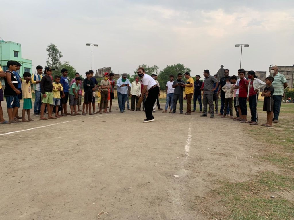 Vote after night, Madan with a cricket bat