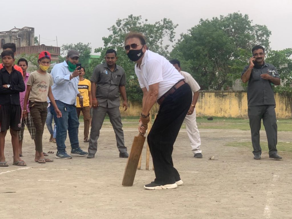 Vote after night, Madan with a cricket bat