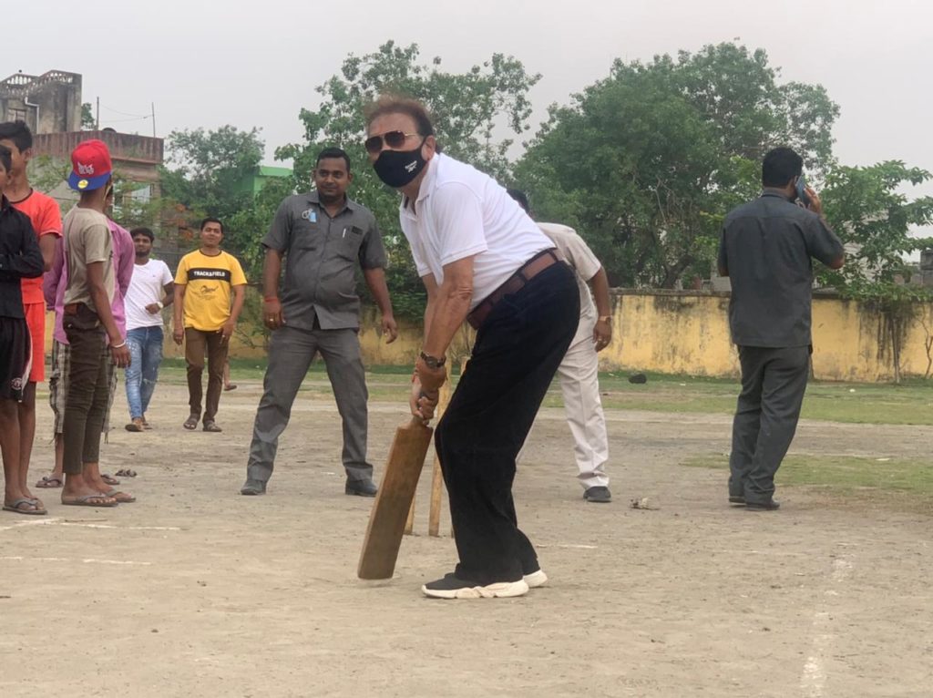 Vote after night, Madan with a cricket bat