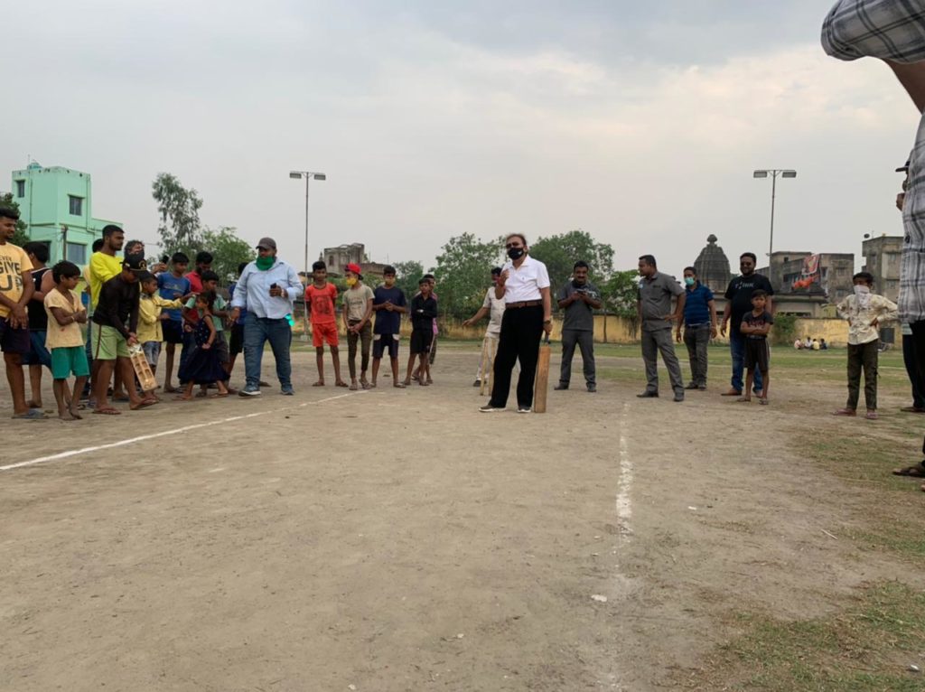 Vote after night, Madan with a cricket bat