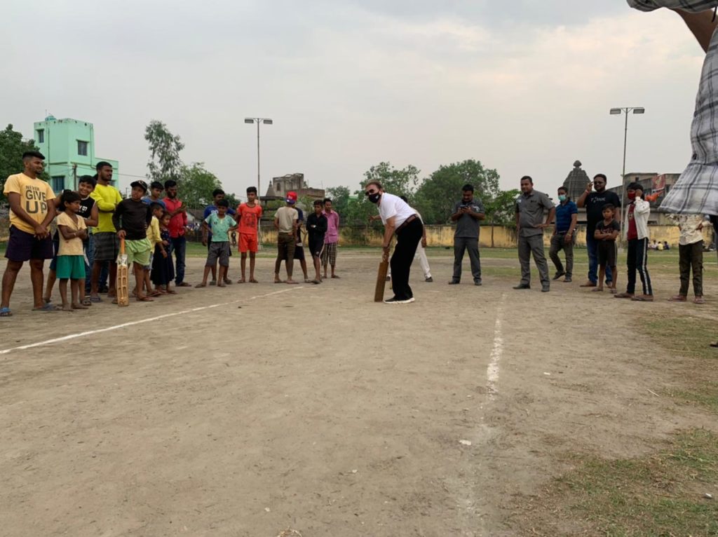 Vote after night, Madan with a cricket bat